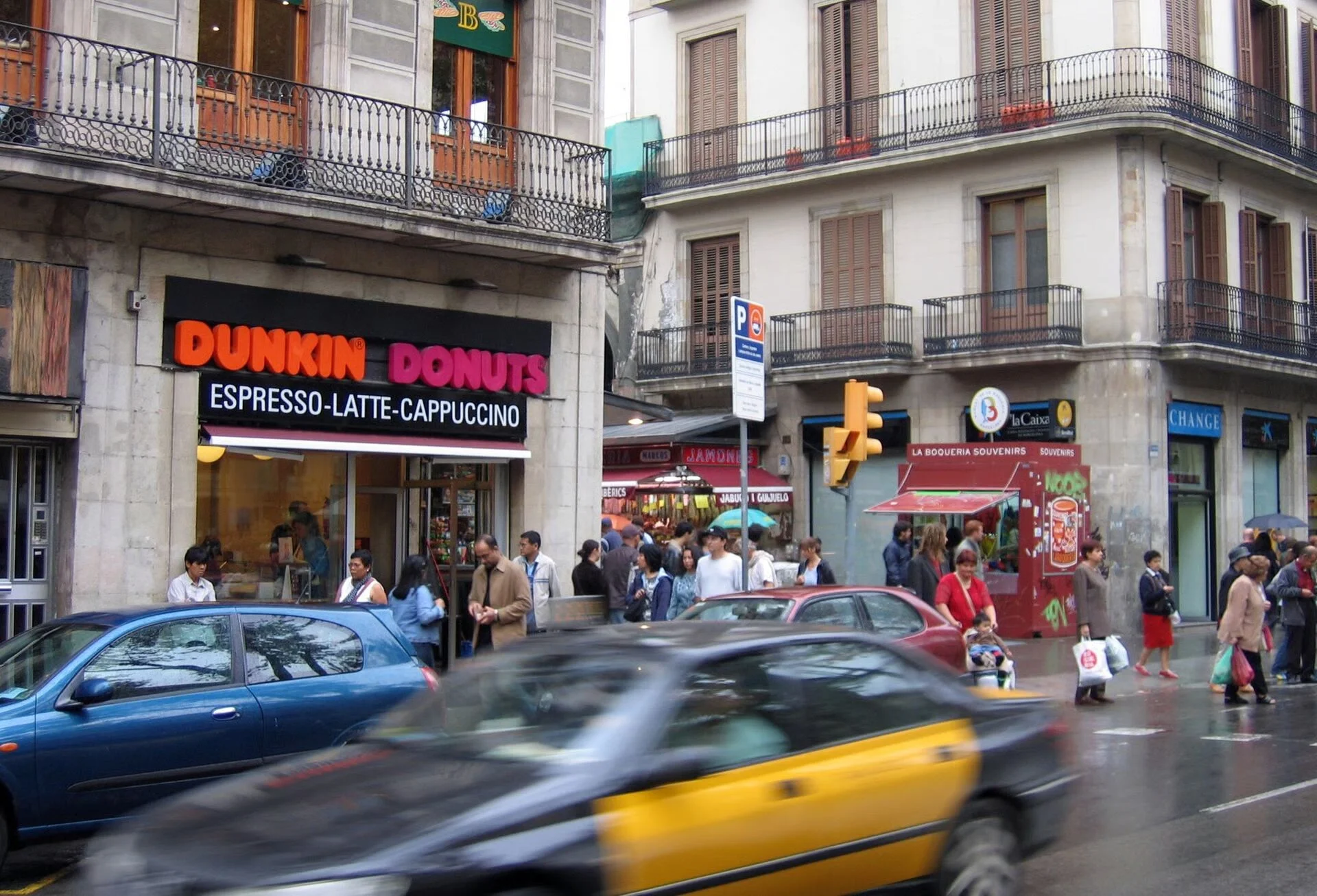 Dunkin' signage in context — an example of brand identity deployed across the urban landscape.